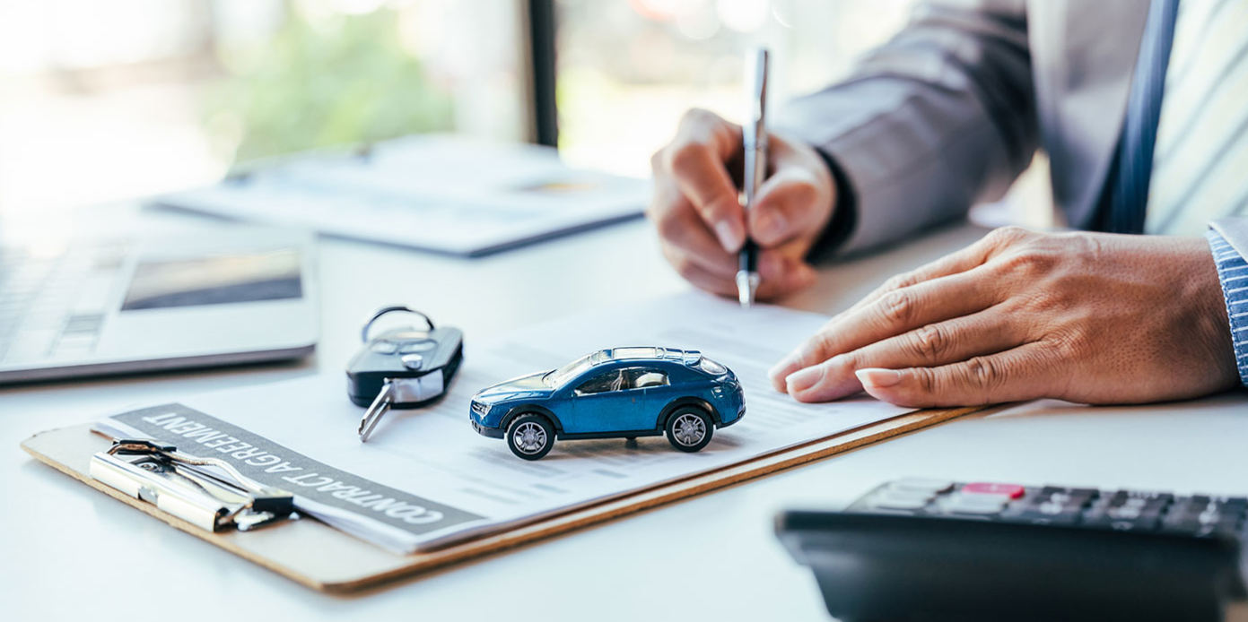 A clients signs an auto insurance contract