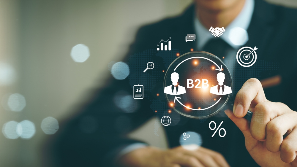 An abstract where a businessman manages B2B affiliate marketing campaigns