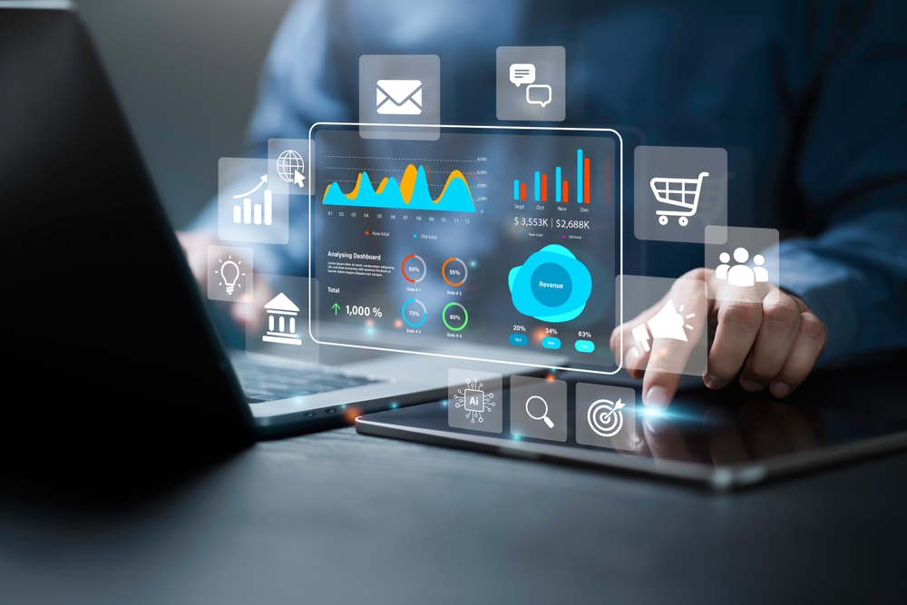 A businessman measures the effectiveness of several marketing channels in the laptop